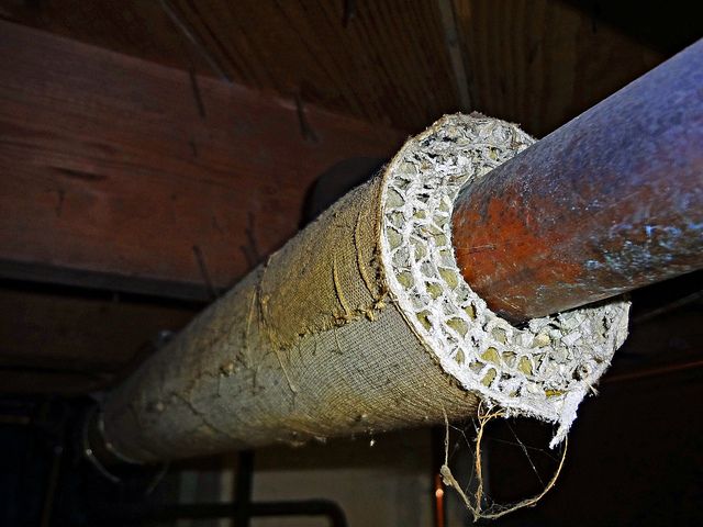 asbestos pipe insulation has a cardboard look